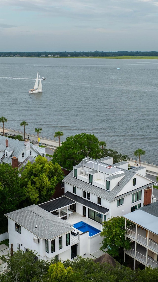 drone / aerial view with a water view