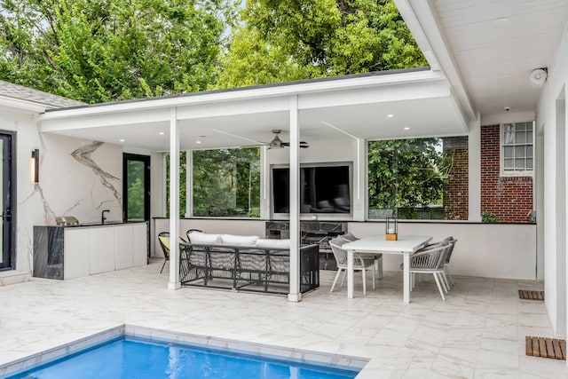 view of pool featuring ceiling fan, outdoor lounge area, and a patio area