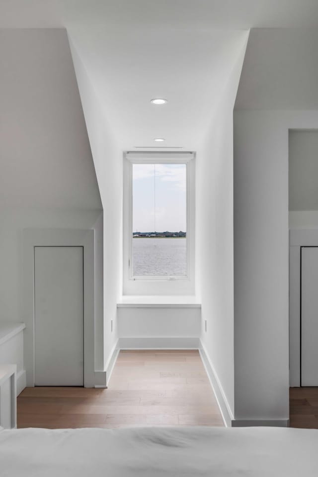 hallway featuring light wood-type flooring