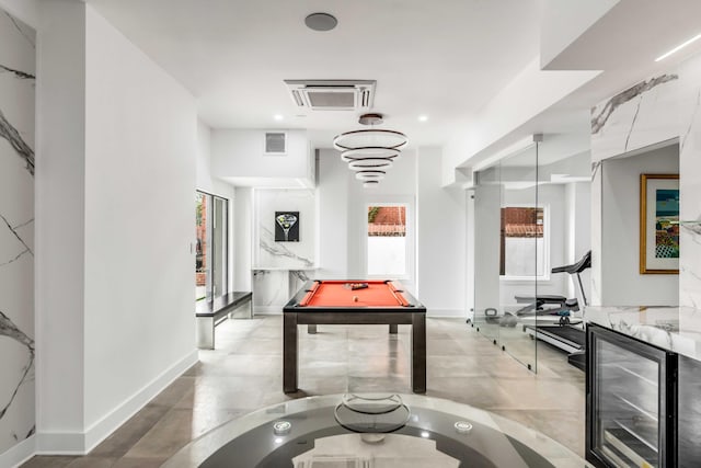 game room featuring wine cooler and billiards