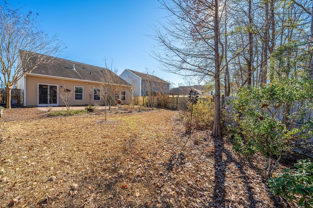 rear view of property featuring a patio area