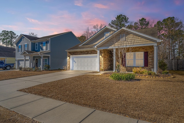 view of front of property with a garage