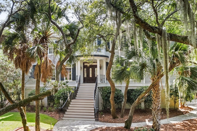 coastal inspired home with covered porch