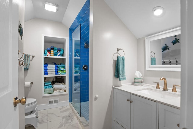 bathroom with vanity, toilet, walk in shower, and lofted ceiling