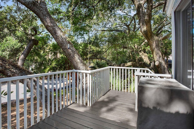 wooden terrace with area for grilling