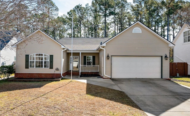 ranch-style house featuring a garage and a porch