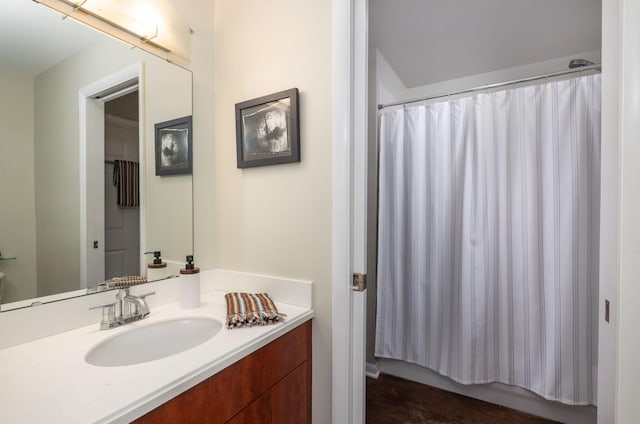 bathroom with vanity and a shower with curtain