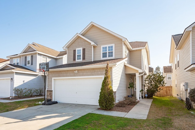 view of front of house with a shingled roof, driveway, an attached garage, and fence