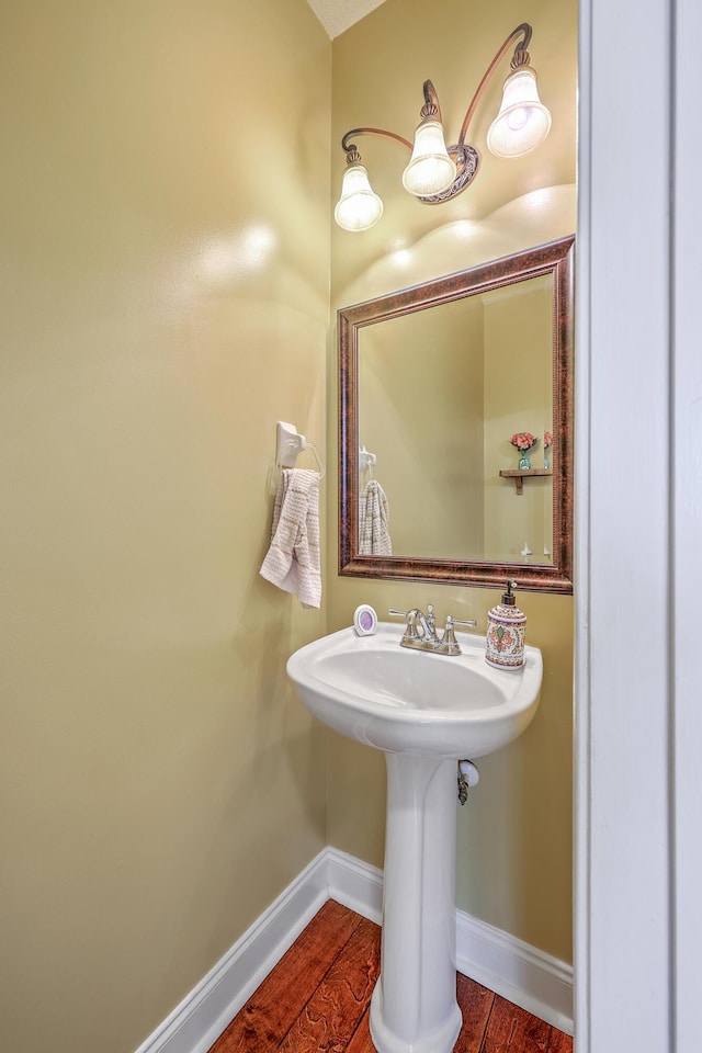 111 Kapalua Run, Summerville, SC 29483 - bathroom featuring baseboards, wood finished floors, and a sink