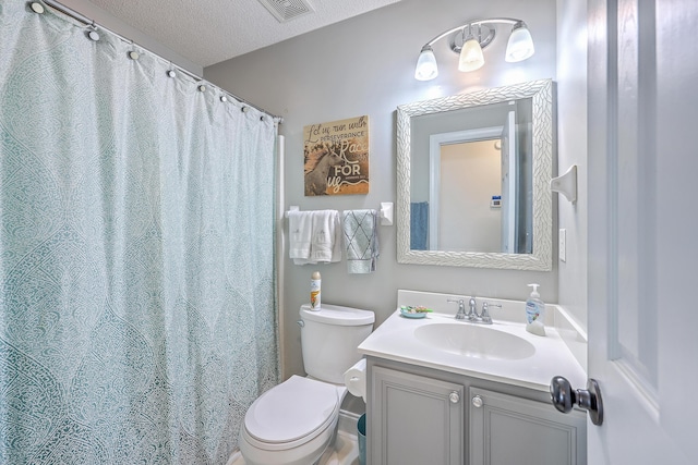 111 Kapalua Run, Summerville, SC 29483 - bathroom with toilet, vanity, and a textured ceiling