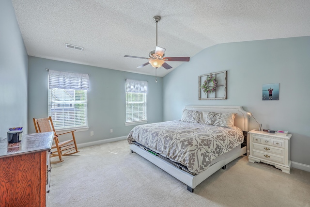 111 Kapalua Run, Summerville, SC 29483 - bedroom with light carpet, lofted ceiling, baseboards, ceiling fan, and a textured ceiling