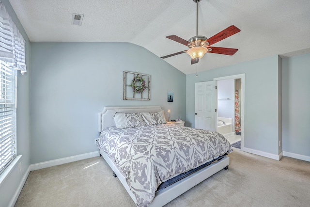 111 Kapalua Run, Summerville, SC 29483 - carpeted bedroom with baseboards, lofted ceiling, a ceiling fan, ensuite bathroom, and a textured ceiling