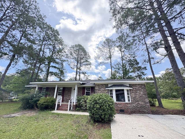 710 Gadsden Loop, Walterboro, SC 29488 - ranch-style home with brick siding, a front lawn, and crawl space