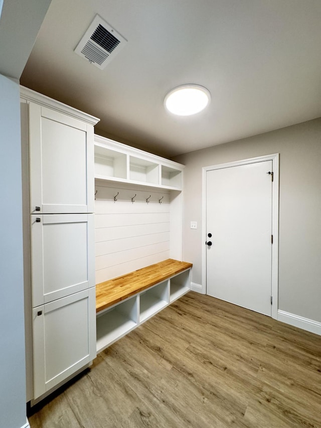 710 Gadsden Loop, Walterboro, SC 29488 - mudroom featuring wood finished floors and baseboards