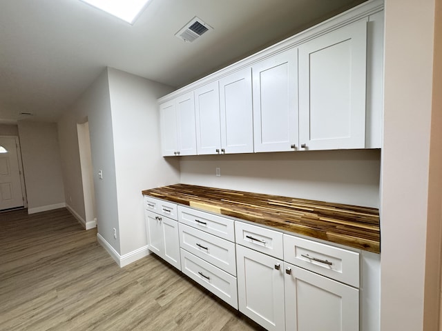 710 Gadsden Loop, Walterboro, SC 29488 - bar area with light wood-type flooring and baseboards