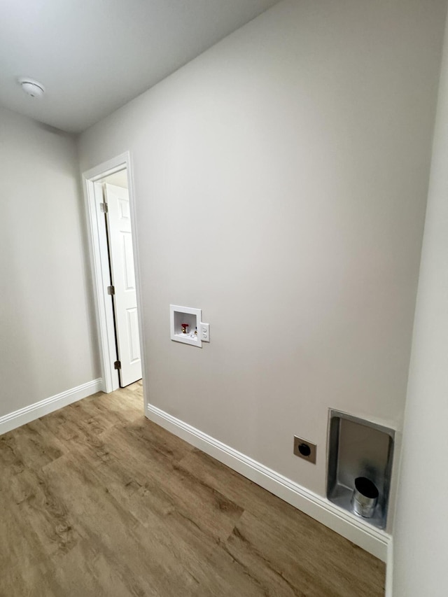 710 Gadsden Loop, Walterboro, SC 29488 - washroom featuring washer hookup, electric dryer hookup, baseboards, and wood finished floors