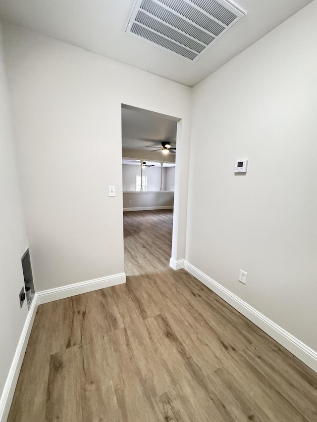 710 Gadsden Loop, Walterboro, SC 29488 - empty room with wood finished floors, baseboards, and ceiling fan