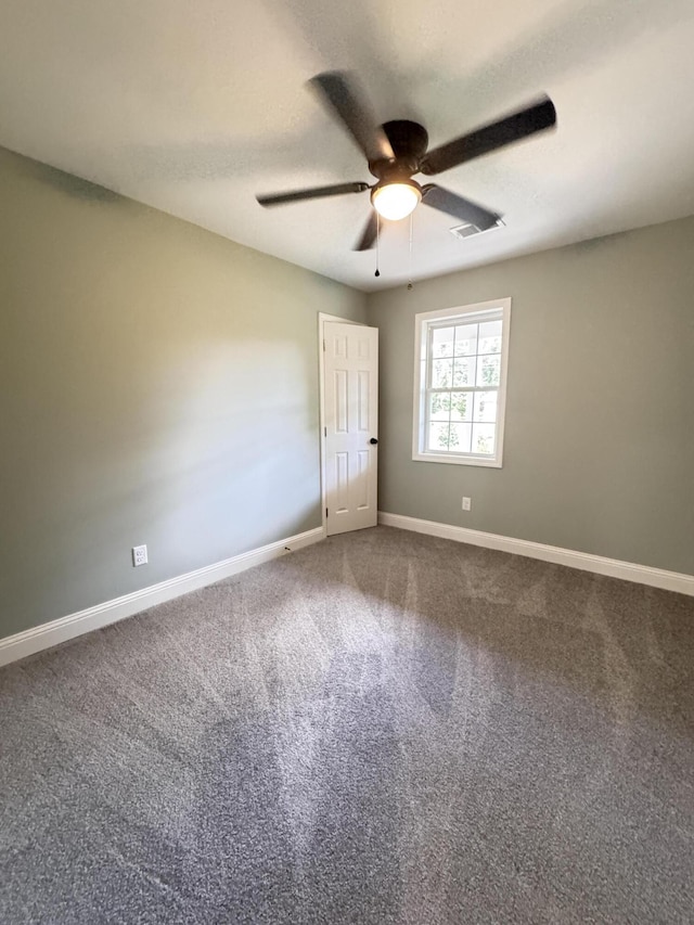 710 Gadsden Loop, Walterboro, SC 29488 - spare room featuring ceiling fan, baseboards, and carpet floors