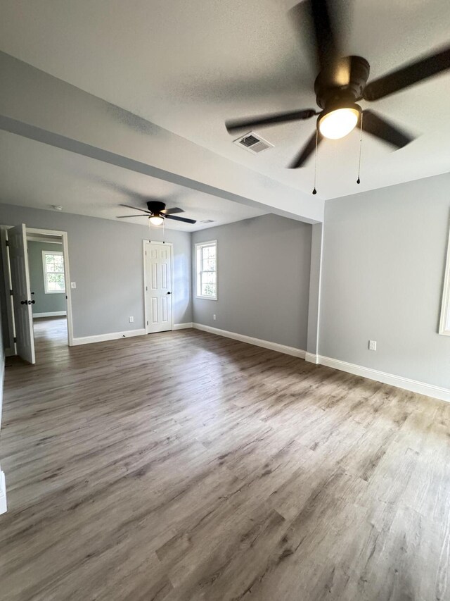 710 Gadsden Loop, Walterboro, SC 29488 - empty room with ceiling fan, wood finished floors, and baseboards