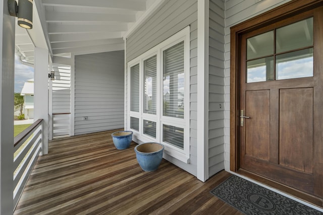 entrance to property with a porch