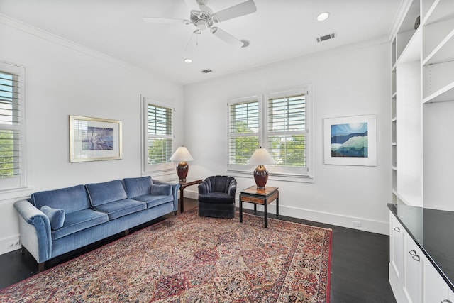 living area featuring ceiling fan, visible vents, dark wood finished floors, baseboards, and recessed lighting
