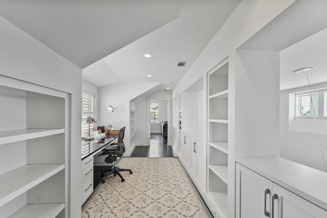 office area featuring recessed lighting, visible vents, built in features, and wood finished floors
