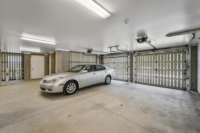 garage featuring a garage door opener