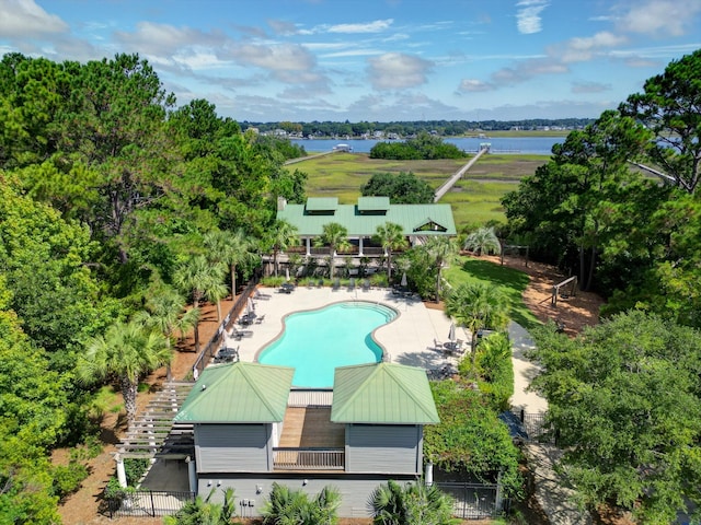 birds eye view of property with a water view