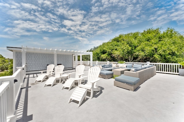 view of patio featuring a pergola and an outdoor living space