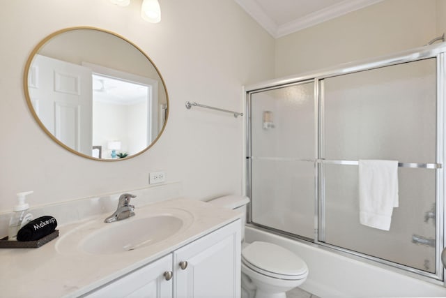 full bathroom with toilet, shower / bath combination with glass door, ornamental molding, and large vanity