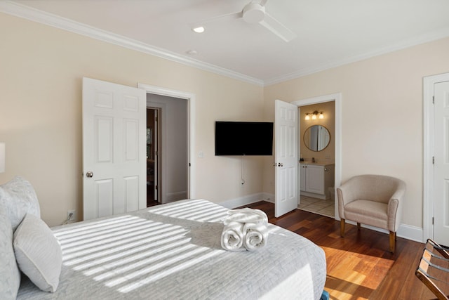 bedroom with dark hardwood / wood-style flooring, ceiling fan, ensuite bathroom, and crown molding