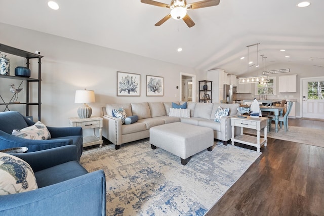 living area featuring recessed lighting, a ceiling fan, lofted ceiling, and wood finished floors