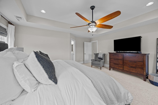 255 Saxony Loop, Summerville, SC 29486 - carpeted bedroom featuring a tray ceiling, recessed lighting, a ceiling fan, baseboards, and ensuite bath