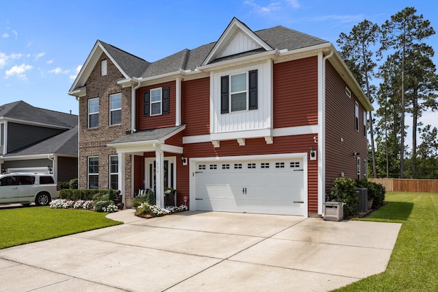 255 Saxony Loop, Summerville, SC 29486 - view of front of property with board and batten siding, an attached garage, driveway, and roof with shingles