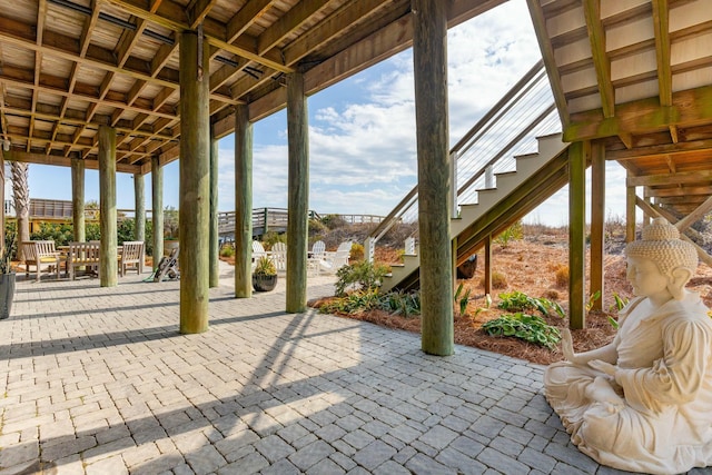 view of patio with stairway