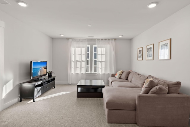 living room featuring light colored carpet