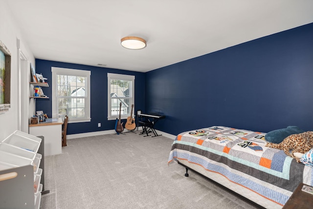 bedroom featuring light colored carpet