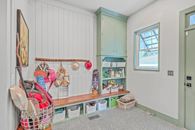 mudroom featuring carpet