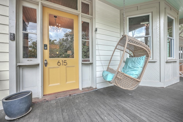 doorway to property featuring a porch