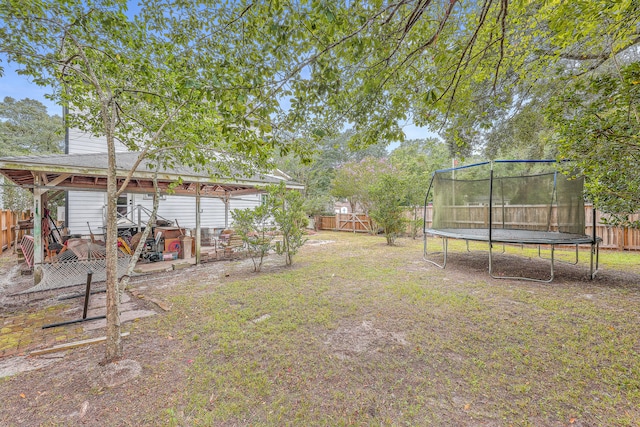 view of yard featuring a trampoline