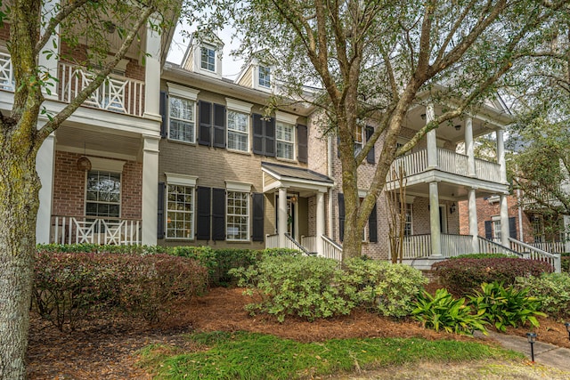 view of front of house featuring brick siding