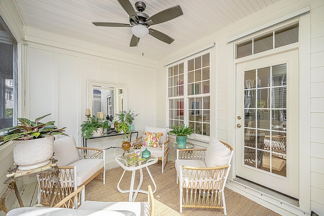 exterior space with covered porch and a ceiling fan