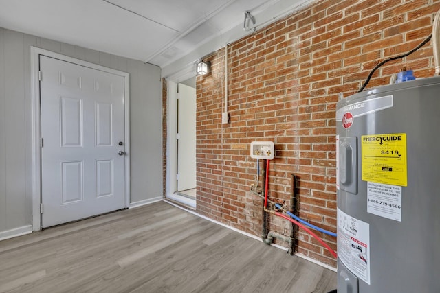 utility room with electric water heater