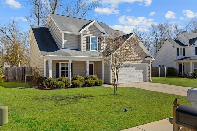 view of front facade with central AC unit, a garage, a front yard, and a porch