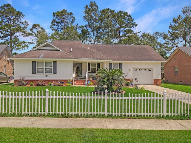 ranch-style house with a garage and a front yard