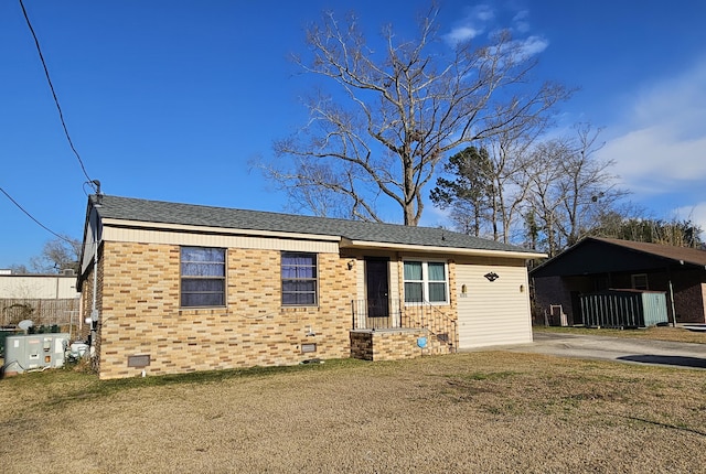 ranch-style house featuring roof with shingles, crawl space, and a front yard