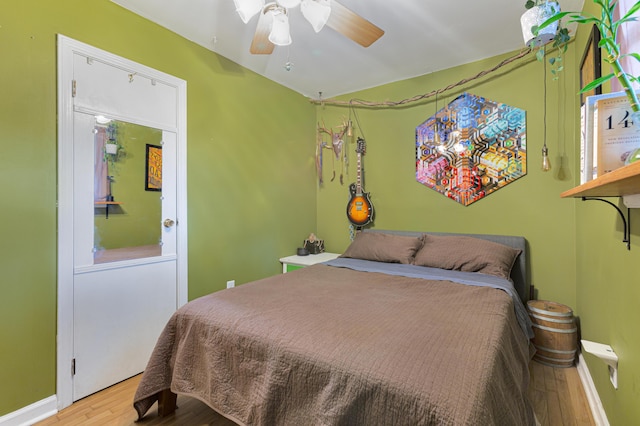 1549 N Avalon Cir, Charleston, SC 29407 - bedroom with wood finished floors, baseboards, and a ceiling fan