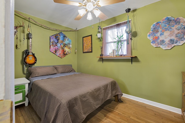 1549 N Avalon Cir, Charleston, SC 29407 - bedroom with hardwood / wood-style floors, baseboards, and a ceiling fan