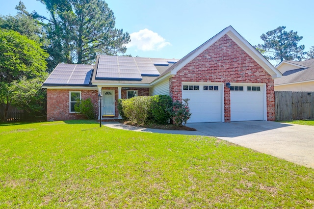 1287 Chatfield St, Mount Pleasant, SC 29464 - traditional home featuring brick siding, solar panels, a garage, and driveway