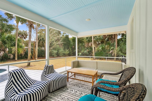 sunroom / solarium with beam ceiling